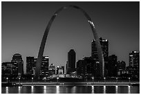 Arch and Old Courthouse across Mississippi River at dusk. Gateway Arch National Park ( black and white)