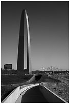 Pathway, railroad tunnel and arch. Gateway Arch National Park ( black and white)
