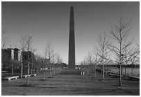 Sideway view of Arch, downtown buildings and Mississippi River in winter. Gateway Arch National Park ( black and white)
