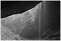 Rain-fed waterfall seen from inside cave. Mammoth Cave National Park, Kentucky, USA. (black and white)