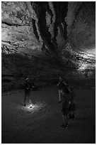 Ranger talking to family in cave. Mammoth Cave National Park ( black and white)