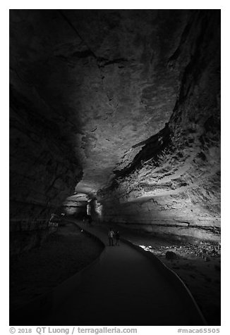 Visitors walk down path in cave. Mammoth Cave National Park (black and white)