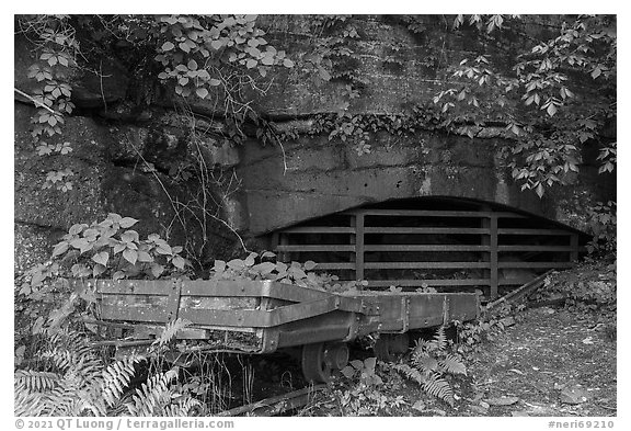 Wagon and mine opening, Kaymoor Mine Site. New River Gorge National Park and Preserve (black and white)