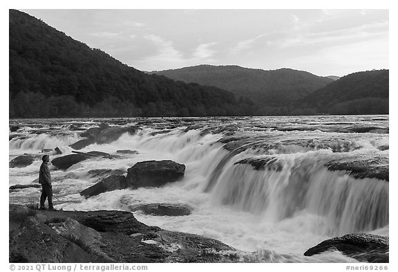 Visitor looking, Sandstone Falls. New River Gorge National Park and Preserve (black and white)