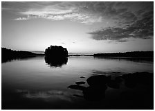 Kabetogama lake sunset with tree-covered islet. Voyageurs National Park ( black and white)