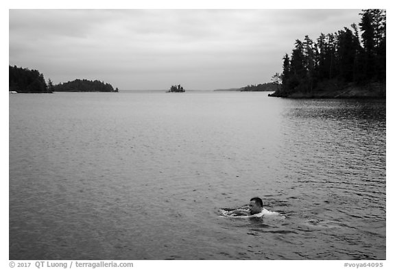 Man swimming, Anderson Bay. Voyageurs National Park (black and white)