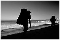 Backpackers on beach, Cuyler harbor, San Miguel Island. Channel Islands National Park, California, USA. (black and white)