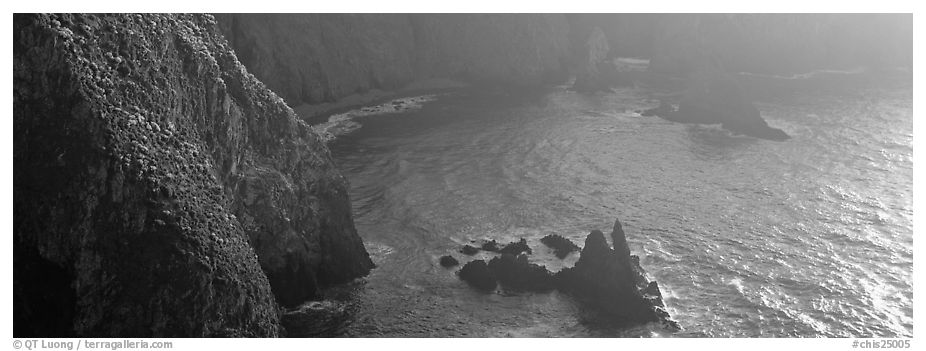 Steep cove with glittering water, Anacapa Island. Channel Islands National Park (black and white)