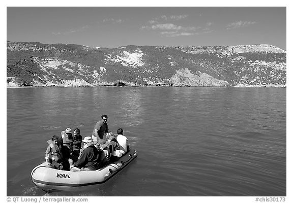 Campers using a skiff to land, San Miguel Island. Channel Islands National Park (black and white)
