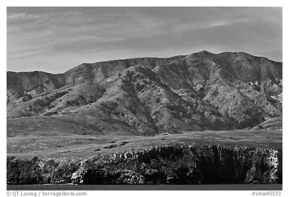 Tall hill ridge and cliff seen from ocean, Santa Cruz Island. Channel Islands National Park (black and white)