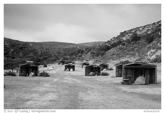 Tents pitched in wind shelters, Santa Rosa Island. Channel Islands National Park (black and white)