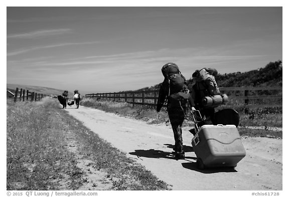 Campers haul gear, Santa Rosa Island. Channel Islands National Park (black and white)