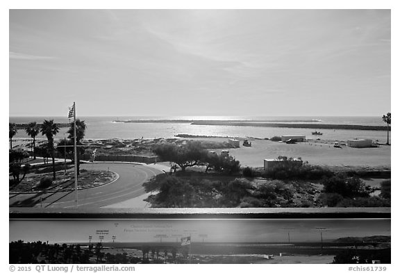 Distant view of the islands from harbor interpretive sign, visitor center. Channel Islands National Park (black and white)