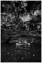 Kayaker in sea cave with low ceiling, Santa Cruz Island. Channel Islands National Park ( black and white)