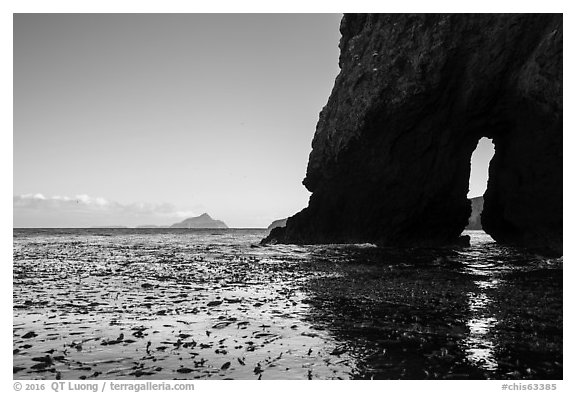 Sea arch, West Anacapa in the distance, Santa Cruz Island. Channel Islands National Park (black and white)