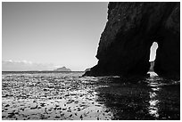 Sea arch, West Anacapa in the distance, Santa Cruz Island. Channel Islands National Park ( black and white)