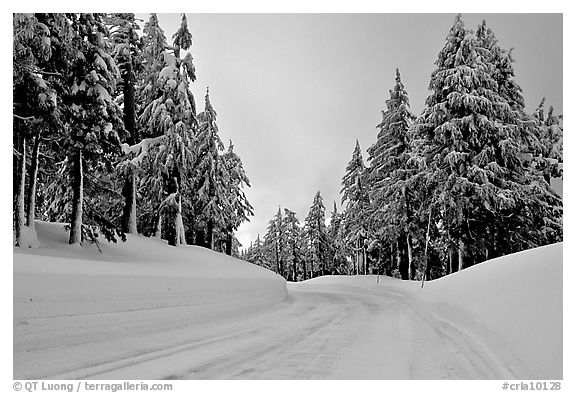 Snow-covered road. Crater Lake National Park, Oregon, USA.