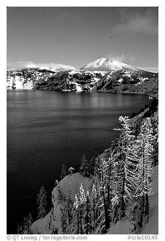 Lake rim in winter with blue skies. Crater Lake National Park (black and white)