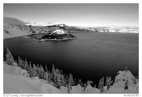 Wizard Island and lake in late afternoon shade, winter. Crater Lake National Park (black and white)