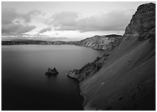 Caldera slopes and Phantom ship at dusk. Crater Lake National Park ( black and white)