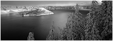 Light on the lake, winter sunrise. Crater Lake National Park (Panoramic black and white)