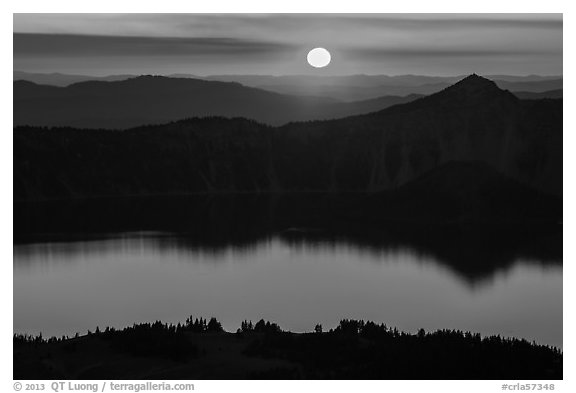 Sun setting over Crater Lake and Llao Rock. Crater Lake National Park (black and white)