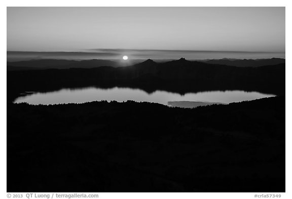 Wide view from Mount Scott of sun setting over Crater Lake. Crater Lake National Park (black and white)