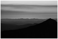 Llao Rock, and mountain ridges at sunset. Crater Lake National Park ( black and white)