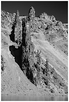 Devils Backbone, vertical dike of dark andesite lining the cliff face. Crater Lake National Park ( black and white)