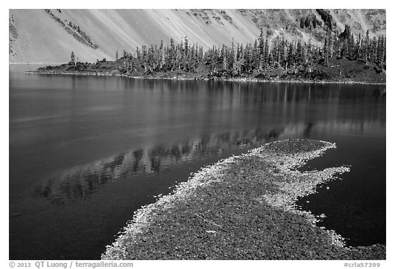 Lava rocks and reflections in Fumarole Bay, Wizard Island. Crater Lake National Park (black and white)