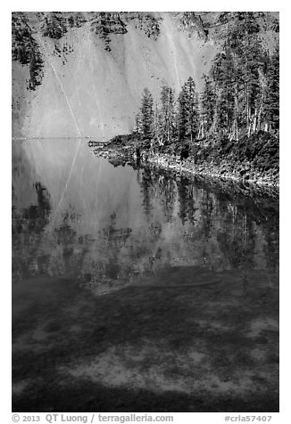 Watchman reflection in clear water of Fumarole Bay, Wizard Island. Crater Lake National Park (black and white)