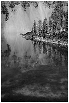 Watchman reflection in clear water of Fumarole Bay, Wizard Island. Crater Lake National Park ( black and white)