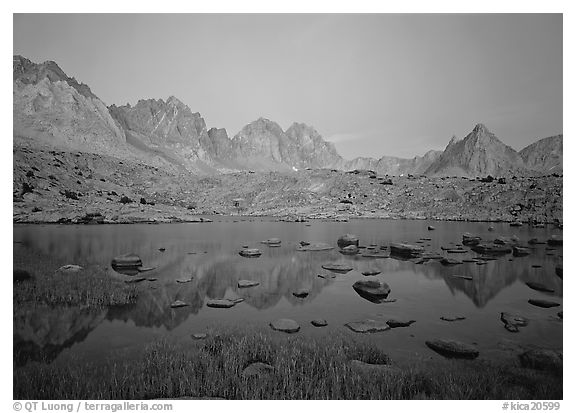 Mt Agasiz, Mt Thunderbolt, and Isoceles Peak reflected in a lake in Dusy Basin, sunset. Kings Canyon National Park (black and white)