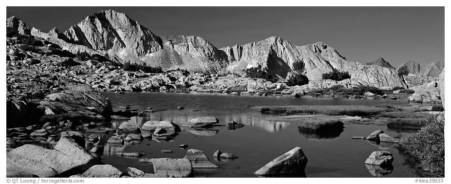 High Sierra peaks reflected in blue alpine lake. Kings Canyon National Park (black and white)