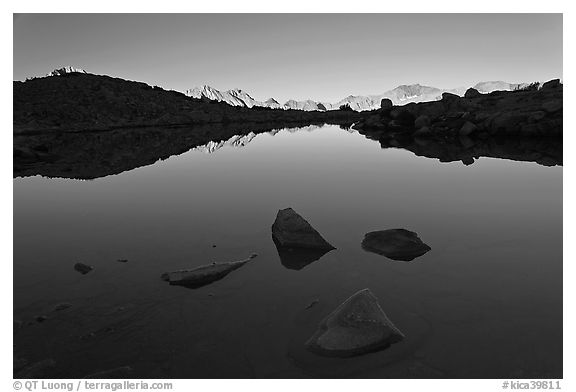 Rocks and calm lake with reflections, early morning, Dusy Basin. Kings Canyon National Park (black and white)