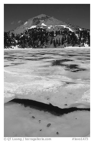 Ice break up in lake Helen and Lassen Peak, early summer. Lassen Volcanic National Park (black and white)