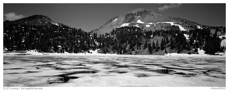 Melting ice in lake and Lassen Peak. Lassen Volcanic National Park (black and white)