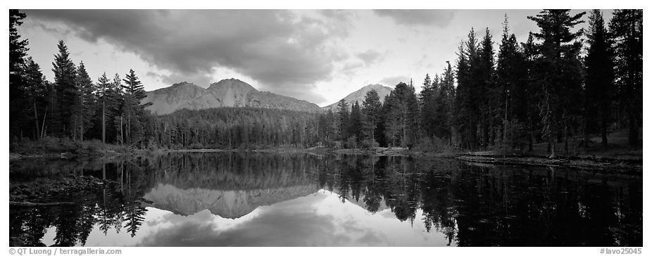 Volcanic peak and conifer reflected in lake. Lassen Volcanic National Park (black and white)