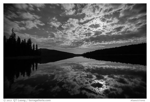 Moonlit clouds over Juniper Lake at night. Lassen Volcanic National Park (black and white)