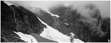 Waterfalls, neves, and clouds, North Cascades National Park.  (Panoramic black and white)