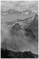 Peaks partly obscured by clouds, North Cascades National Park.  ( black and white)
