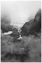 Hanging glacier in fog, North Cascades National Park. Washington, USA. (black and white)