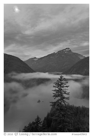 Diablo Lake, fog, and moon, dawn, North Cascades National Park Service Complex. Washington, USA.