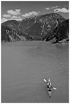 Kayaker on Diablo Lake,  North Cascades National Park Service Complex. Washington, USA. (black and white)