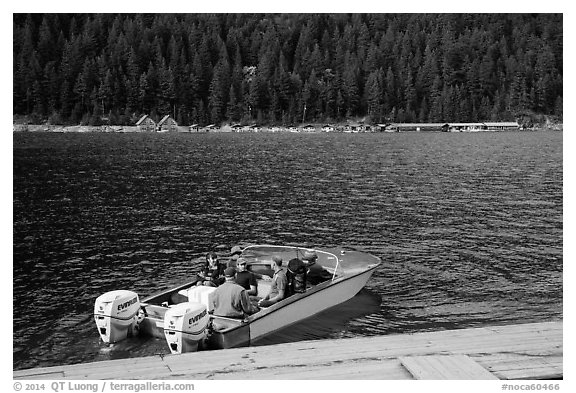 Boat ride across lake to Ross Lake resort, North Cascades National Park Service Complex.  (black and white)
