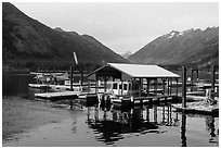 Fuel pump, boat, and floatplane, Stehekin, North Cascades National Park Service Complex.  ( black and white)