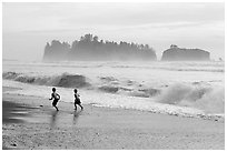 Children running along surf, Rialto Beach. Olympic National Park ( black and white)