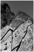High Peaks trails with stairs carved in stone. Pinnacles National Park, California, USA. (black and white)