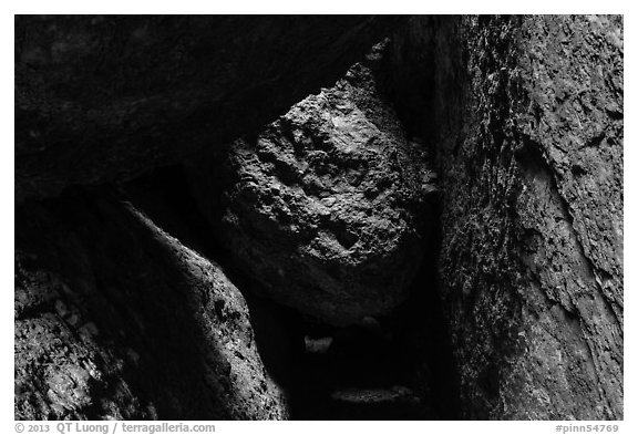 Dark passage with wedged boulder, Balconies Cave. Pinnacles National Park (black and white)