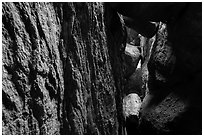 Narrow talus cave, Bear Gulch Cave. Pinnacles National Park ( black and white)